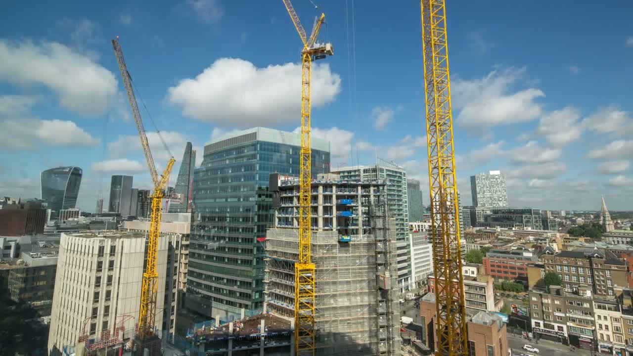 High-rise development under construction against a city skyline